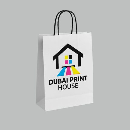 Custom printed paper bag with Dubai Print House logo in CMYK colors.